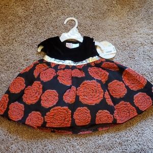 Black dress with red flowers